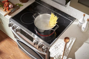 pasta cooking on a electric range stove top